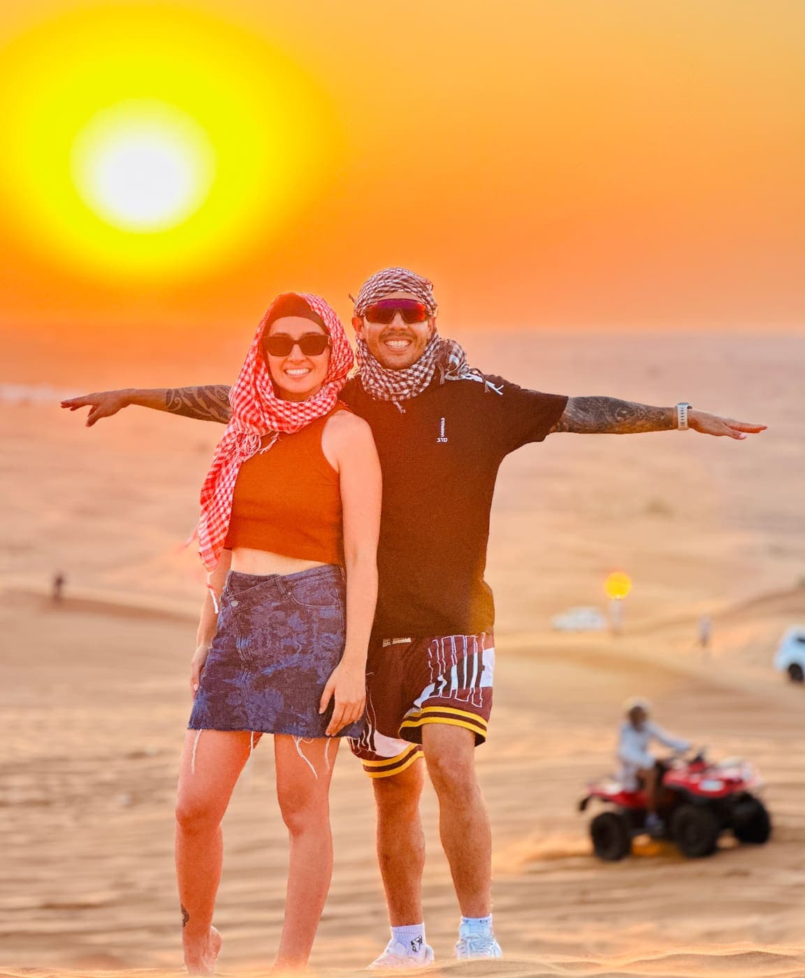 Marcela and Esty, who build PATO, standing together at sunset